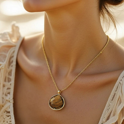 “Drop of Light” Pendant in Tiger’s Eye