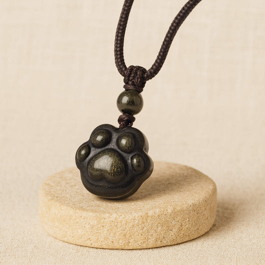 “Eternal Bond” Paw Pendant in Golden Obsidian - SPIRAD