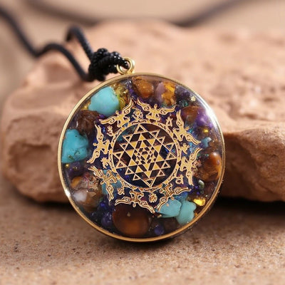 Orgonite Pendant “Sri Yantra” in Turquoise & Tiger’s Eye - SPIRAD